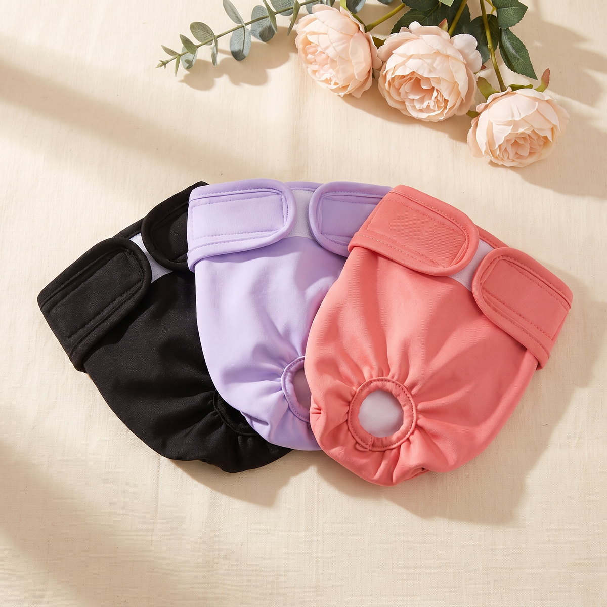 PeeCover washable dog diapers in black, purple and pink